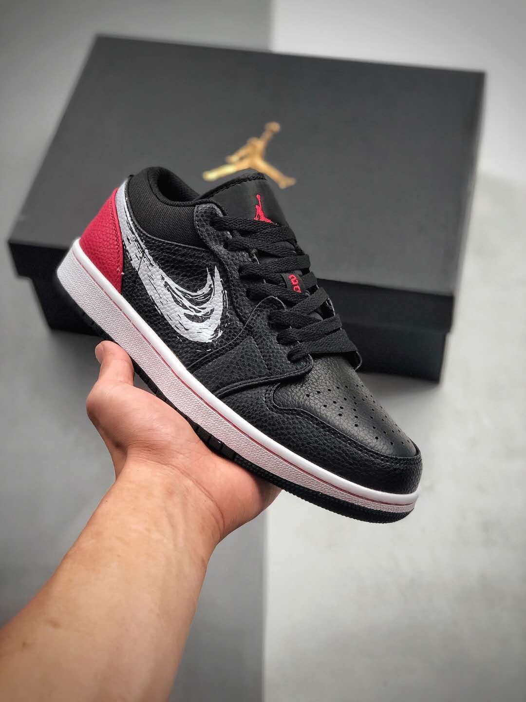 Air Jordan 1 Low 'Brushstroke Swoosh - Black Red' DA4659-001 | Stylish and iconic sneakers